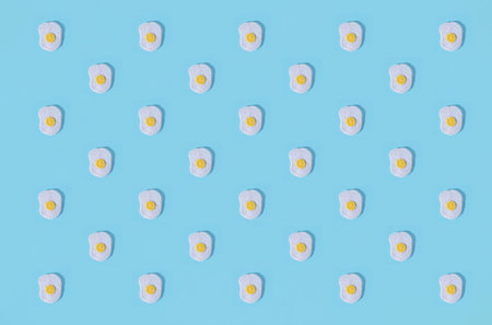 Toys in the form of food hand made of felt on blue background. hand sewing. Minimal artistic food concept.の写真素材