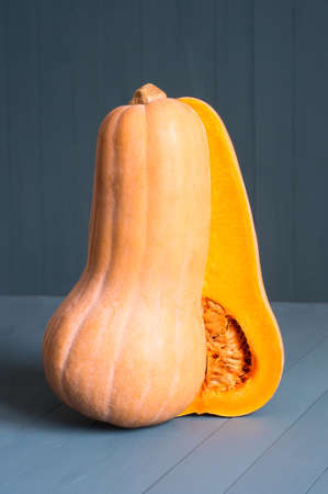 Fresh Butternut Squash. Raw orange organic butternut squash ready to bake. bottle shaped butternut pumpkinの写真素材