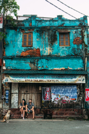 Guy and girl traveling around Asia. The couple travels to Sri Lanka. Man and woman traveling. A trip to Asia. Asian country. An unusual journey. The students are travelingのeditorial素材