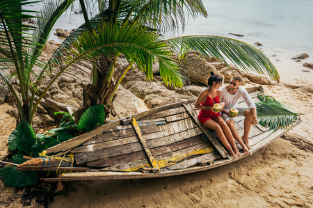 Honeymoon trip. Wedding travel. Couple in love off the coast. Couple on the island. Man and woman in the Maldives. Relax on the island. Holiday romance. Travel to Asia. Thailand, Phuketの写真素材