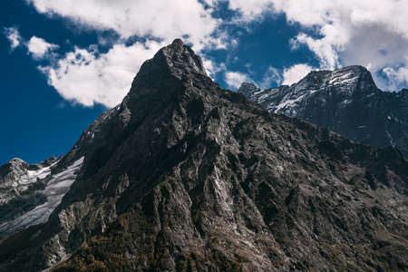 Mountain glacier. Stunning views of the mountain. Grand view over steep slopes on a sunny winter day. Mountain peak. Copy spaceの写真素材