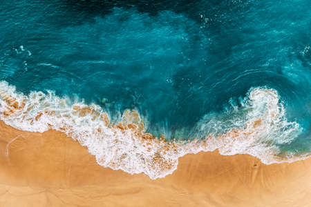 Relaxing aerial beach scene, summer vacation holiday template banner. Waves surf with amazing blue ocean lagoon, sea shore, coastline. Perfect aerial drone top view. Peaceful bright beach, seasideの写真素材