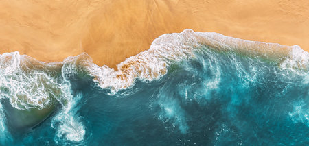 Sandy beach, panorama. Panoramic view of the sandy beach. The sea wave rolls on the shore. Sea coast view from the air. Aerial photography of the sea wave. The ocean and beach. Copy spaceの写真素材