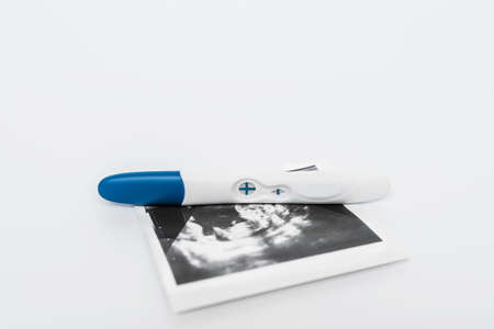 Positive pregnancy test on ultrasound photo. A positive pregnancy test result. Pregnancy test...