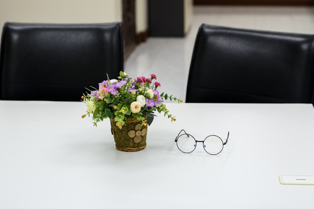 Desks flower and glassの写真素材