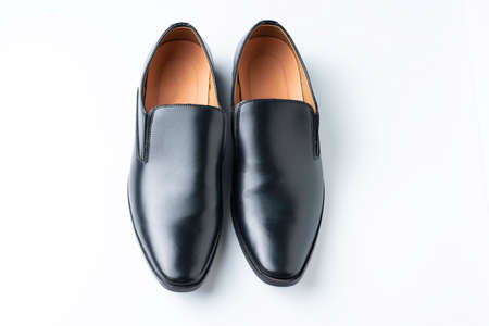A pair of black loafer shoes isolated, for men fashion style with shadow isolated white background