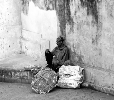 A roadside vendor waiting to sell his goods in Indiaの写真素材