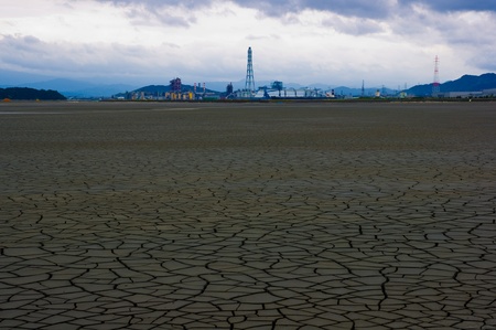 The dry earth and factoryの写真素材