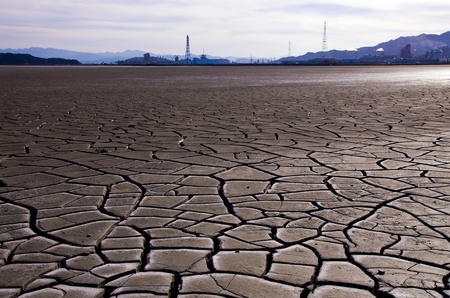 The dry earth and factoryの写真素材