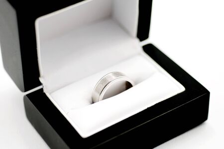 His white gold ring in stylish black jewelery boxの写真素材