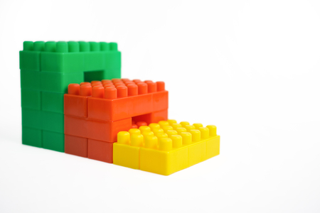 Stairs of colorful brick toys isolated on white background.の写真素材
