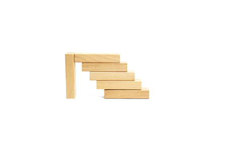 Wooden blocks stairs isolated on white background.の写真素材