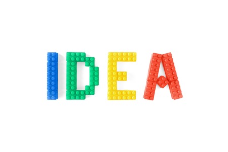 IDEA word with colorful plastic brick toys isolated on white background.の写真素材