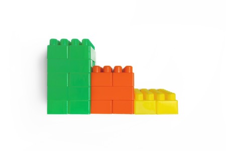Stairs of colorful brick toys isolated on white background.の写真素材