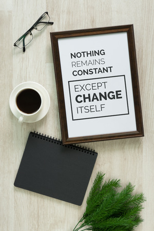 Motivational and inspirational quote. Wisdom quote. Wood frame and on wood background with quote.Rustic nostalgia flat lay.の写真素材