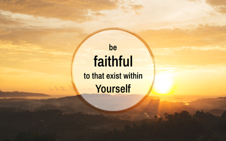 Motivational and inspirational quote. Seascape view during sunset with quote about being faithful in life.の写真素材