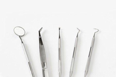Orthodontics dental instruments on white background.の写真素材
