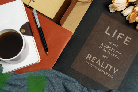 Inspirational and motivation life quote on home office desk - Life is Not a Problem to be Solved,...
