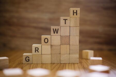 Growth word on wooden blocks staircase.の写真素材