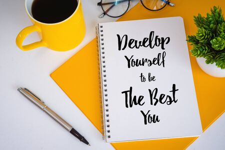 Coffee Mug and Notebook With Inspirational and Motivational Quote.の写真素材