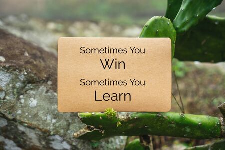Motivational and Inspirational Quote. Sometimes You Win Sometimes You Learn. Paper Card On Cactus.の写真素材