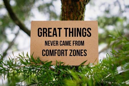 Motivational and Inspirational Quote. Great Things Never Came From Comfort Zones. Paper Card On Nature.の写真素材