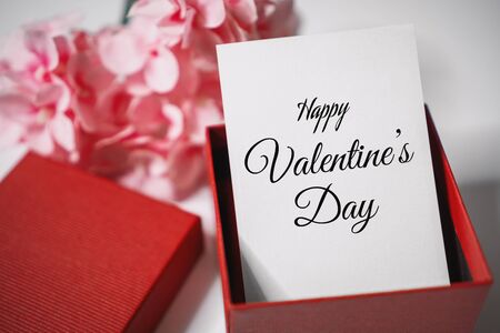 Happy Valentine's Day. Paper Card in Gift Box. Love and Romance Concept.の写真素材