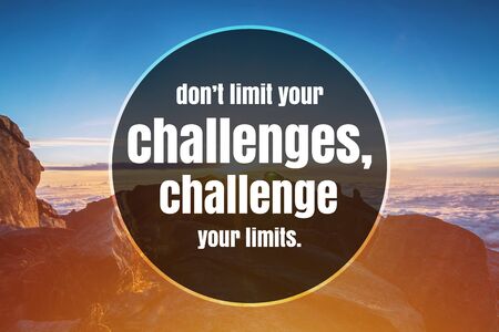 Inspirational and Motivational Quote. Don't Limit Your Challenges, Challenge Your Limits. Mountain Top Background.の写真素材