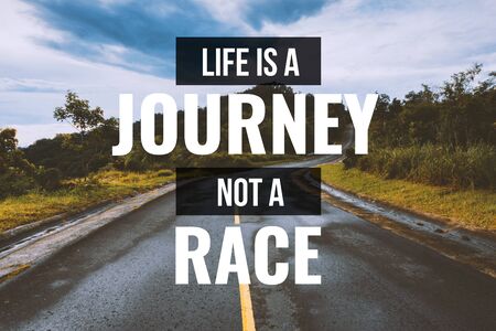Inspirational and Motivational Quote. Life is a Journey, Not a Race. Country Asphalt Road Background.の写真素材