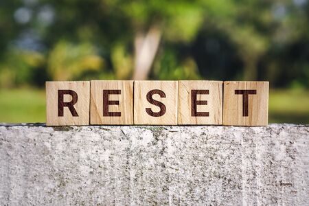 Wooden Block With The Word Resetの写真素材