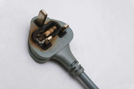 Broken and Damaged Burnt 3 Pin Plugの写真素材