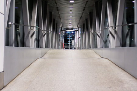 Airport terminal arrival walkway with no travelers.の写真素材