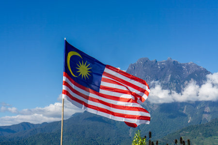 Flag of Malaysia with Scenic Mount Kinabalu Viewの写真素材