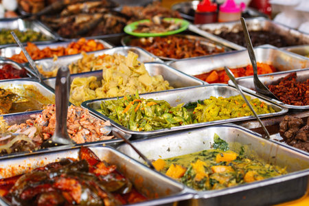 Assorted Malaysian culinary delights on display at a local street food stall.の写真素材