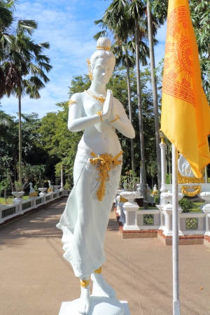 Thai female statue greet  sawasdee  in templeの写真素材