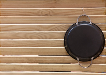 Black Pan with wood backgroundの写真素材