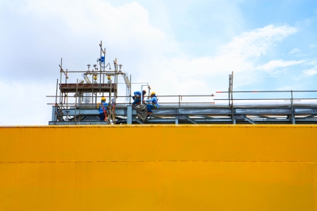 Petroleum workers are maintaining the Refinery Pipe line