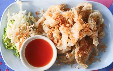 Deep fried fish with spicy sauceの写真素材