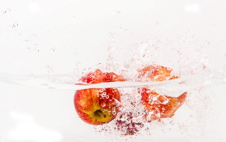 apples in waterの写真素材