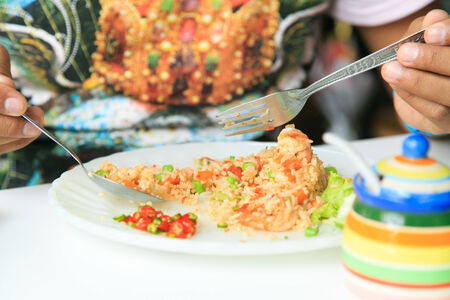 Eating chilli and riceの写真素材