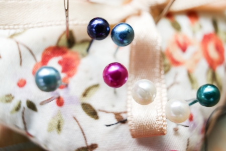 Colorful pins on pillow pinの写真素材