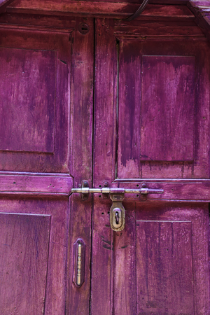 Old purple wood doorの写真素材