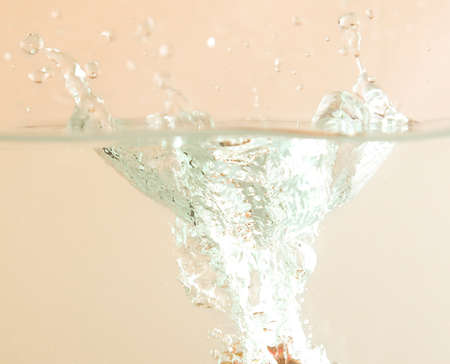 Mangosteen in water splashの写真素材
