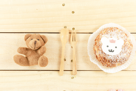 top view of choux cream and brown bear doll and utensilsの写真素材