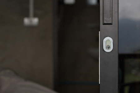 Modern slide glass door's key hole close upの写真素材
