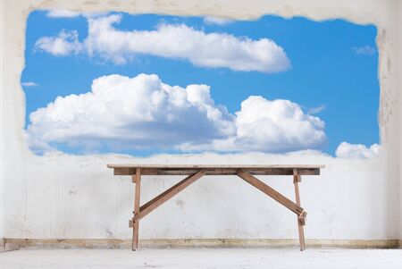 Wooden carpenter bench on dirty white wall, Noboday in roomの写真素材