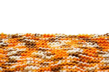 Knitting wool or woven yarn with metal stick as leisure of woman handicraft. Handmade scarf of wool tread as knitwear for warm clothの写真素材