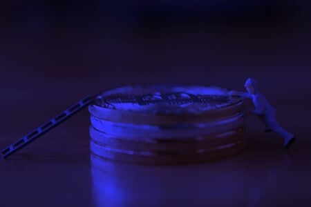 orker clmbing up to top as robber or thief bank or hacker from internetdeaの写真素材