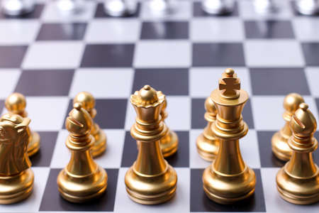 Chess, game of chess or boardd game with many type and charactor. Gold and silver chess. Compeitition on business and education. Strategy conceptの写真素材