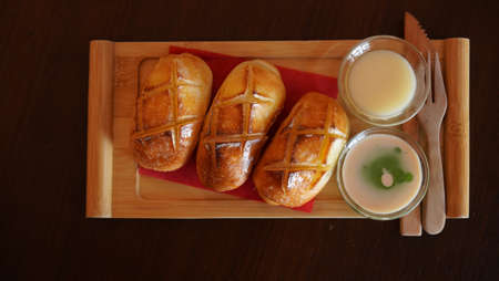 Fried mantou, chinese flour bun with condensed milk and cream dipping. Traditional cantanese snack...